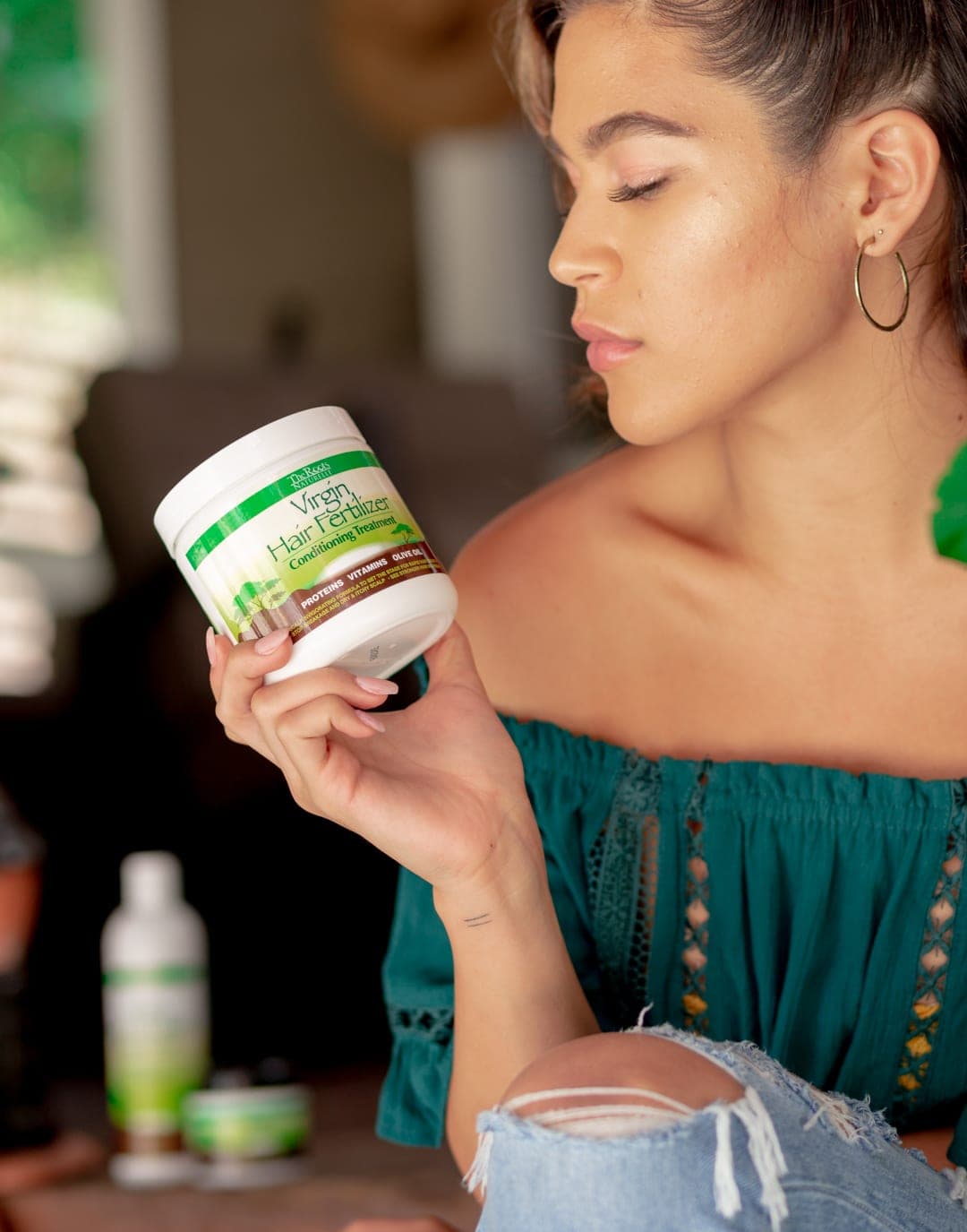 A model with The Roots Naturelle Virgin Hair Fertilizer